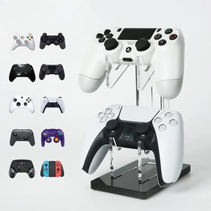 Dual-tier acrylic controller stand showing compatibility with PS4, PS5, and Xbox gamepads