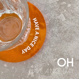 Nordic orange translucent acrylic coaster with white Have a Nice Day text print