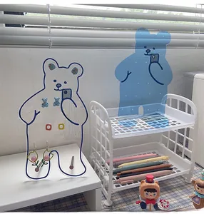 Macro detail of bear-shaped acrylic jewelry stands for earring and necklace storage