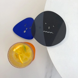 Three-piece set of colorful acrylic coasters with creative hollow expression faces