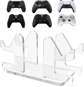 Clear acrylic game controller stand showing multi-tier storage for multiple gamepads