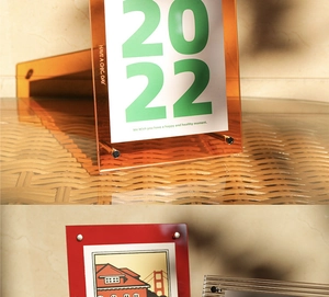 Detail van acryl fotolijst met metalen schroeven en chique bureau-accessoires