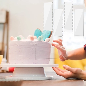 Detailed use of acrylic cake scraper set for smoothing frosting with textured edges