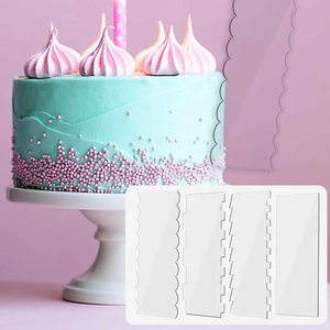 Detail of 4pcs acrylic cake scrapers creating wave patterns on mint green frosting