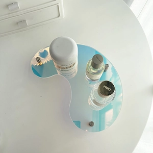 Irregular iridescent acrylic tray with silver metal stands for stylish desk organization