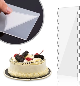 Macro detail of acrylic cake scraper showing protective film removal and serrated edges