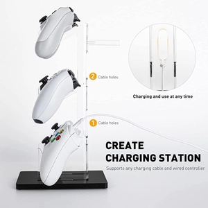 Three-tier acrylic game controller stand with cable holes for organized charging