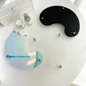 Irregular acrylic coffee tray set with metallic support legs in minimalist Nordic style