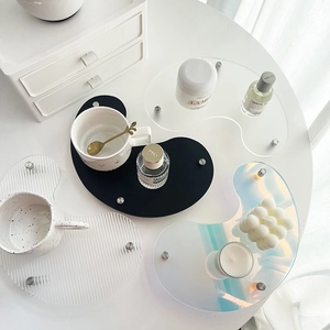 Irregular acrylic tray set with silver legs in clear, black, striped and laser finishes