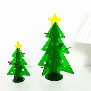 Mini acrylic Christmas tree set with green translucent finish and yellow star topper