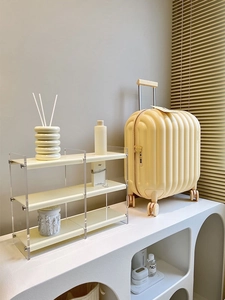 Acrylic desktop organizer shelf and suitcase shaped storage box with elegant soft lighting