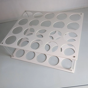 Top-down view of 25-hole clear acrylic vinyl storage rack with silver metal pillars