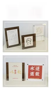 Detail of acrylic photo frame with metal screw fasteners and transparent brown finish
