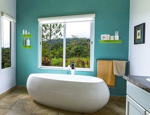 Green acrylic floating shelf set showing wall mounting for bathroom toiletries