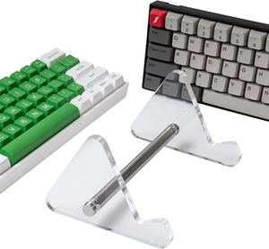 Primer plano del soporte de acrílico para teclado con barra de metal y vista de perfil