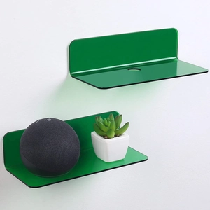 Set of two green acrylic floating shelves with cable holes on white wall