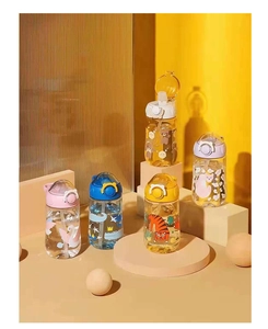 Detailed view of colorful cartoon animal water bottles for kids with straw lids