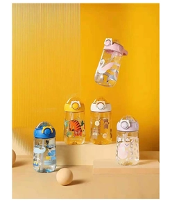 Close-up of diverse animal-themed straw water bottles for kids with colored lids