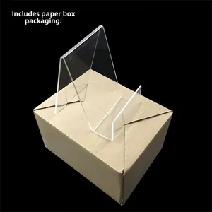 Clear acrylic display stand shown with its matching protective brown cardboard box packaging