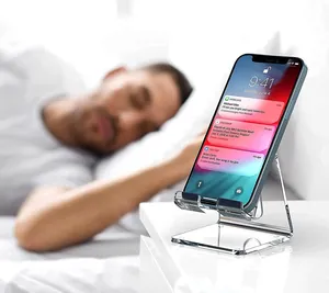 Clear acrylic phone stand for desk with non-slip base and ergonomic viewing angle