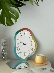 Close-up of a melting surrealist wall clock with rainbow edges and Roman numerals