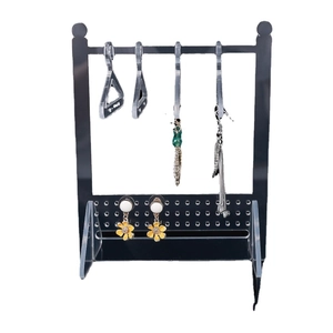 Creative black acrylic jewelry stand with mini hangers for earrings and necklace storage