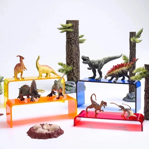 Support de présentation en acrylique coloré avec figurines de dinosaures et décor