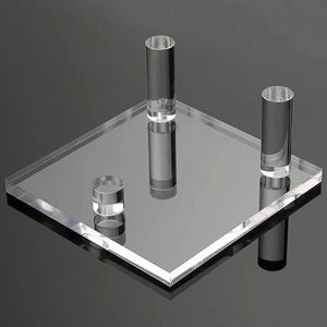 Three-pillar acrylic display stand for crystals and minerals on a black base