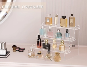 Three-tier clear acrylic tiered riser stand for perfume and cosmetic display