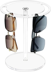 Detail of clear acrylic 360-degree rotating sunglasses display stand with hanging slots
