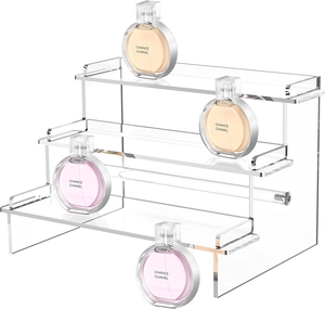 Detailed side view of high-transparency three-tier acrylic display riser stand
