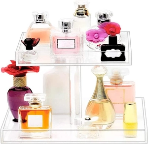 Macro view of clear two-tier acrylic organizer showing steps and high transparency