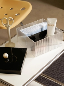 Close-up of clear fluted acrylic storage box featuring modern wave texture and high transparency