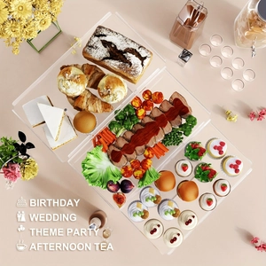 Detailed view of clear acrylic tiered food display risers for wedding cake and desserts