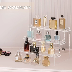 Three-tier transparent acrylic display stand for perfume and cosmetic organization