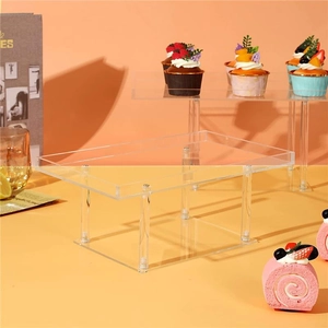Clear acrylic cake stand with four pillars for wedding dessert displays and parties