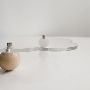 Acrylic cloud-shaped dessert stand with wooden ball feet for elegant wedding display