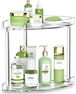 Detail of 2-tier acrylic corner shelf with silver metal supports and non-slip pads