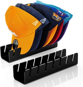 Detail view of black acrylic baseball cap rack with seven slots for hat organization