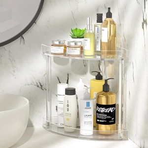 Detail view of a 2-tier transparent acrylic corner organizer for bathroom countertops
