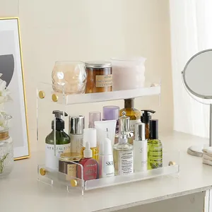 Detail of double-layer acrylic organizer with frosted shelves and gold metal fasteners