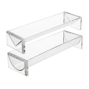 Clear acrylic rectangular serving trays and U-shaped food display stands for parties