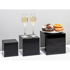 Three-piece black glossy acrylic nesting display cubes for cupcakes and cosmetics
