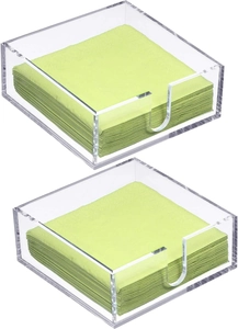 Set of two clear acrylic napkin holders with U-shaped side opening on white background