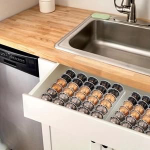 Clear acrylic coffee pod drawer tray organizer for 30 capsules shown in kitchen drawer
