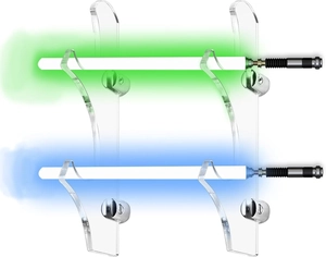 Macro view of transparent acrylic wall mounts with metal fixings for lightsaber display