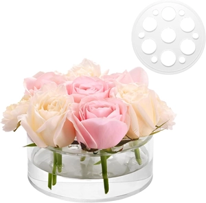 Detail of transparent acrylic floral arrangement disc with nine holes for table centerpieces