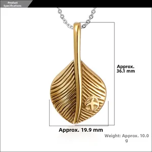 Detail view of gold feather pendant dimensions with silver chain 36.1mm by 19.9mm