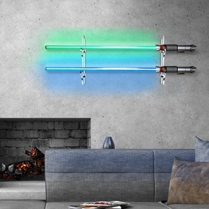 Wall-mounted acrylic lightsaber display rack with blue and green swords in modern home interior