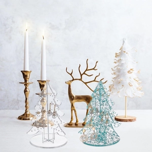 Christmas tree shaped acrylic earring organizers in clear and blue glitter finish